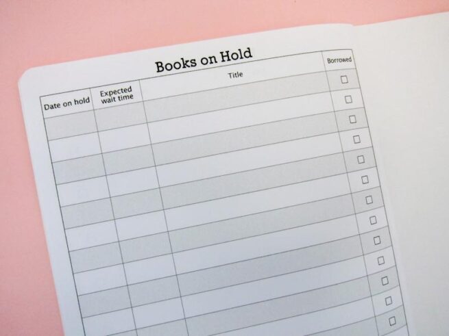 close up of books on hold page in the reading tracker notebook